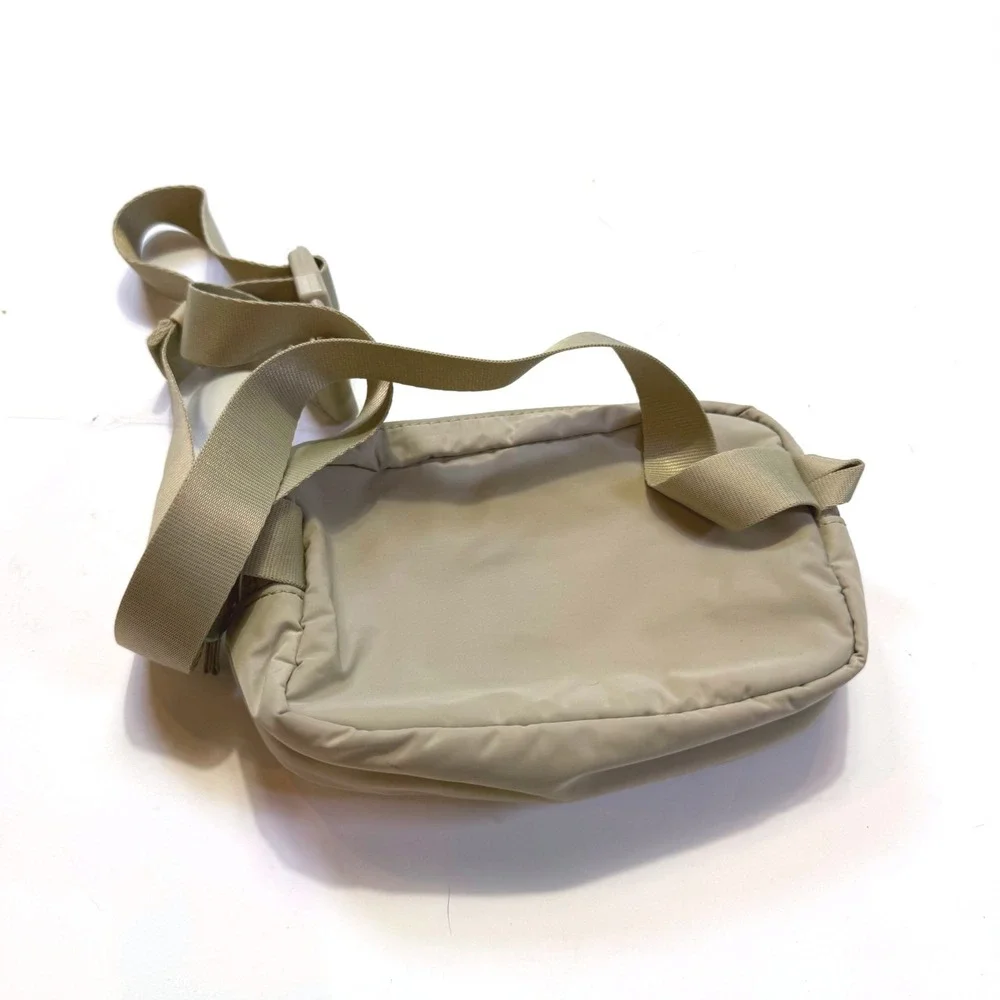 Athleta Excursion Belt Bag Tan Nylon Crossbody Fanny Pack Adjustable Strap Zip
